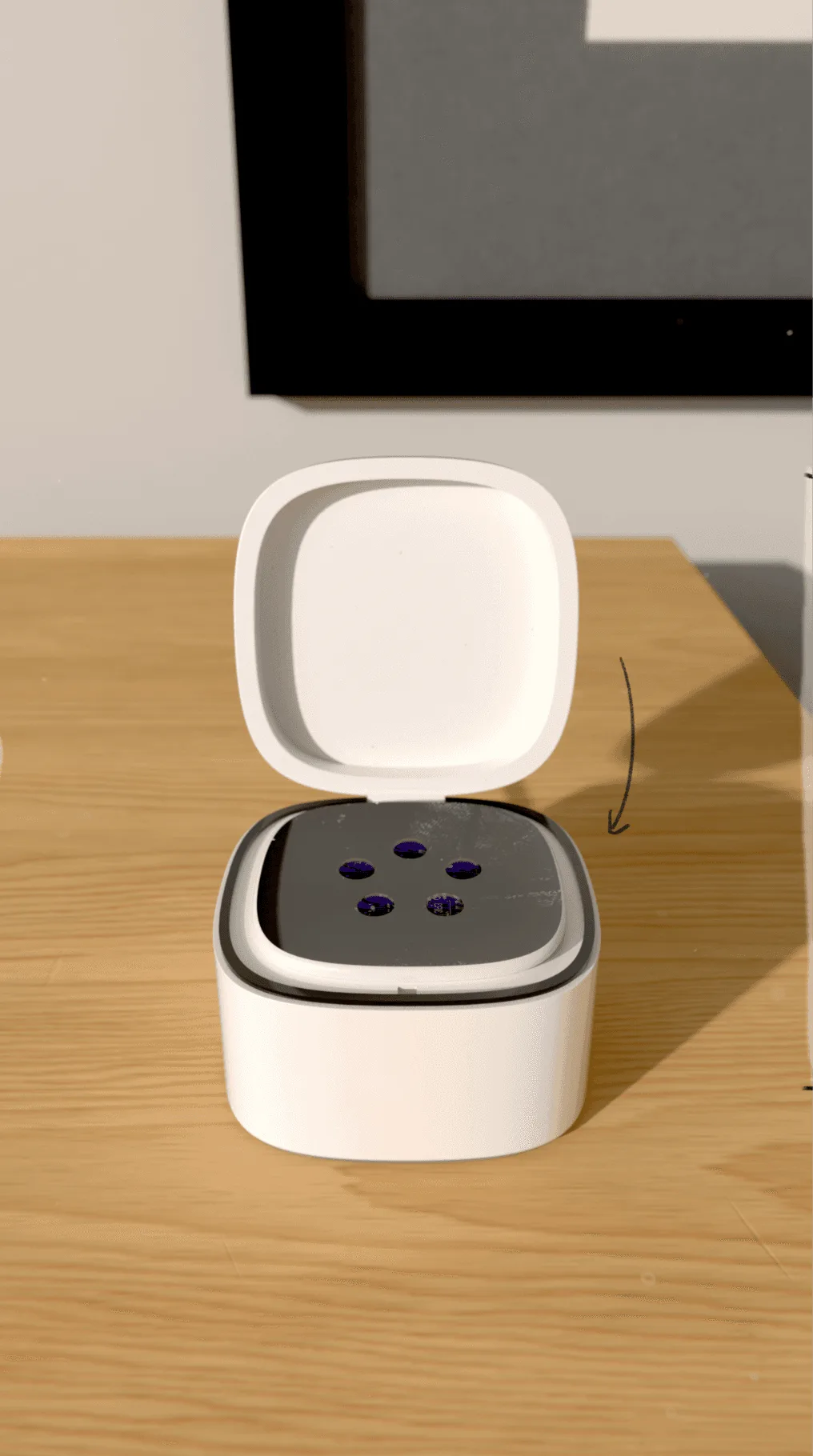 Close the lid: the dock charges the spare and protects it from dust and abrasion.